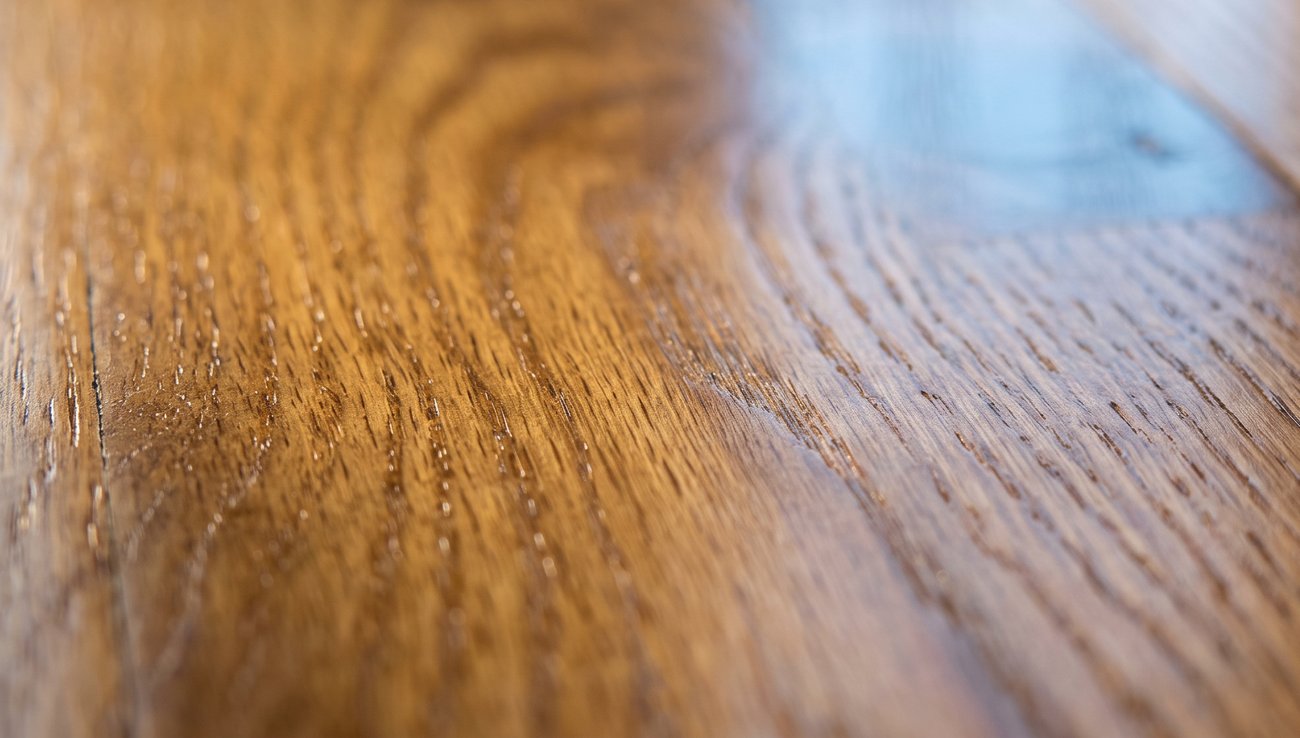 Close up of refinished white oak grain with a satin finish